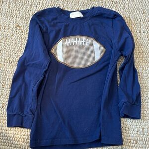 Never worn. Navy boys football tee